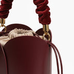 VICIDERCI Althea vegan leather bucket bag in wine red detail view