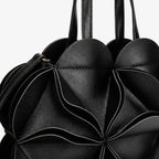 VICIDERCI Amelisse vegan leather evening bag in black detail view