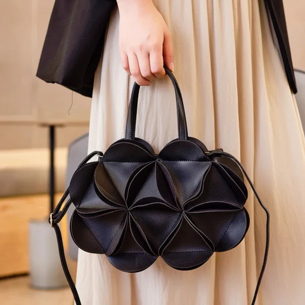 VICIDERCI Amelisse vegan leather evening bag in black model view