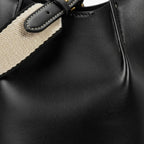 VICIDERCI Calypso canvas with vegan leather trim crossbody bag in black detail view