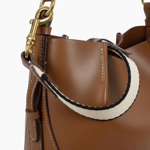 VICIDERCI Calypso canvas with vegan leather trim crossbody bag in brown detail view