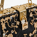 VICIDERCI Zephyra high-gloss acrylic evening bag in black detail view