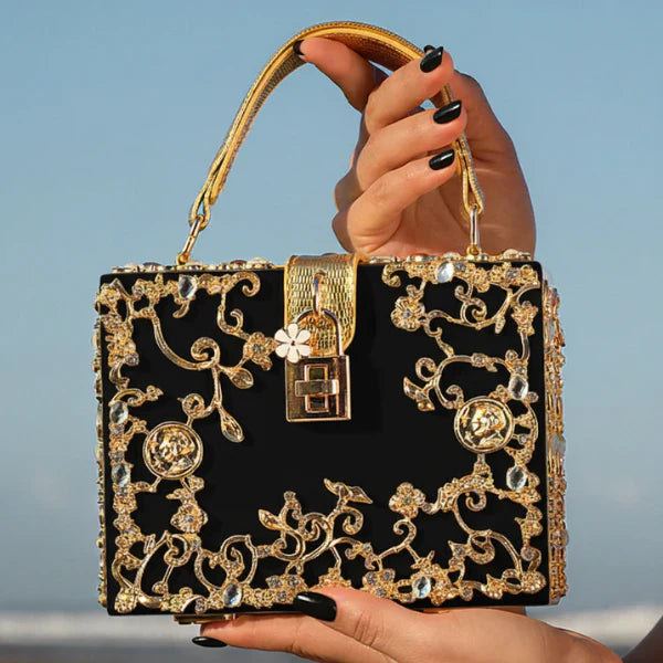 VICIDERCI Zephyra high-gloss acrylic evening bag in black lifestyle view