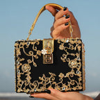 VICIDERCI Zephyra high-gloss acrylic evening bag in black lifestyle view