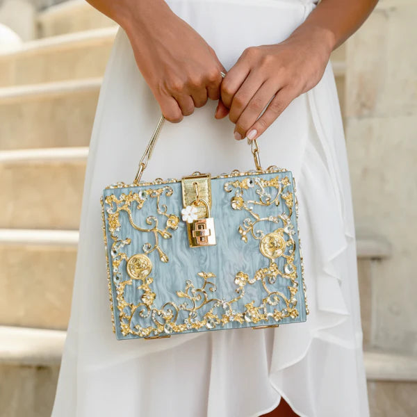 VICIDERCI Zephyra high-gloss acrylic evening bag in blue model view