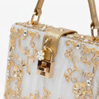 VICIDERCI Zephyra high-gloss acrylic evening bag in white detail view